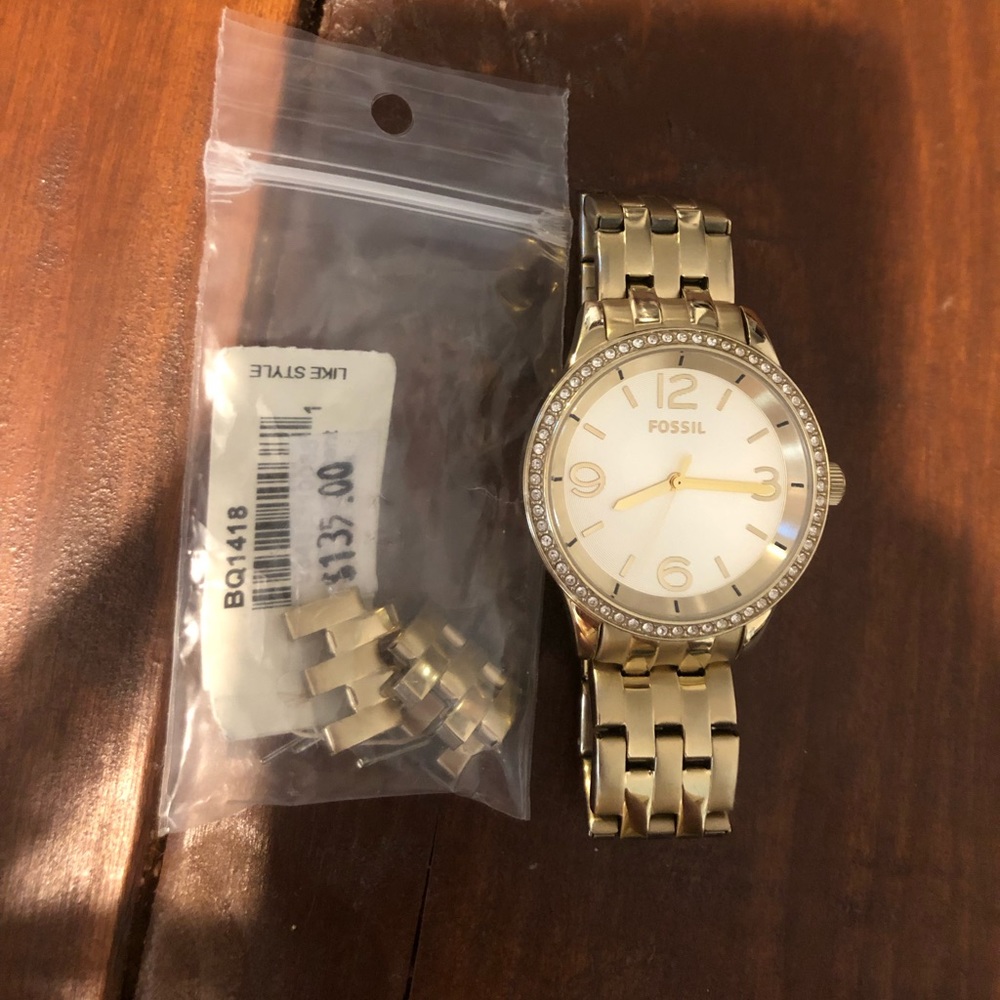 Gold fossil watch